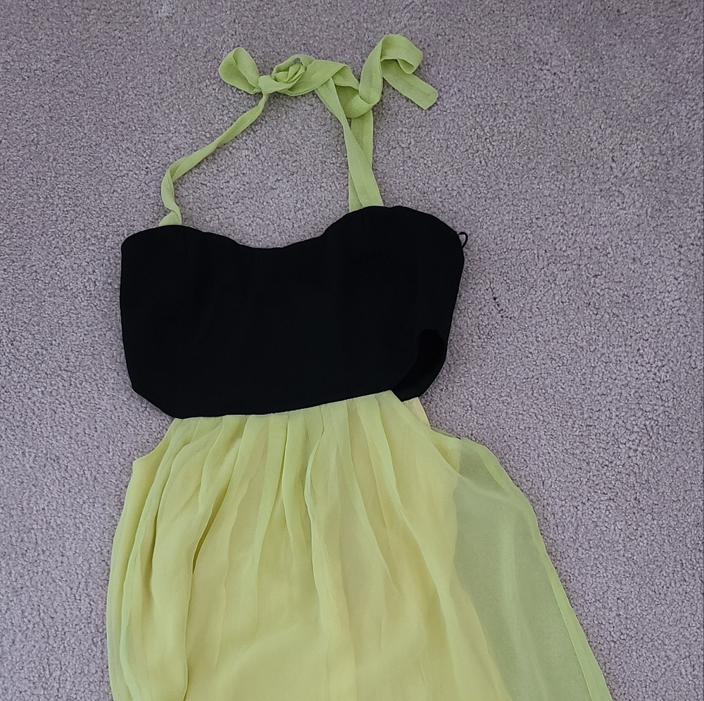 NWT maxi halter dress. Cut out side, sheer lined fabric. Size small
